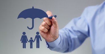 Unity Financial Solutions - Businessman hand drawing an umbrella